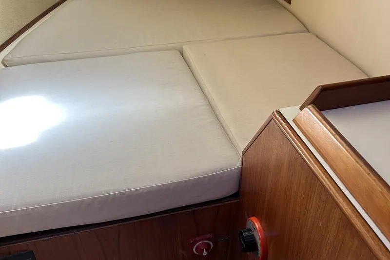 Slide: The Image of Interior cabin of 1987 Pearson 39-2 sailboat with cushioned berth. - 14