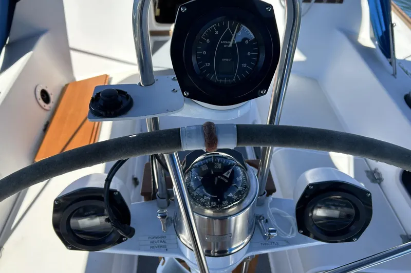 Slide: The Image of Cockpit view of 1987 Pearson 39-2 sailboat with compass and navigation instruments. - 19
