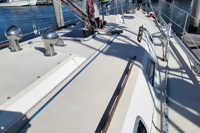 Slide: The Image of Sailboat deck of 1987 Pearson 39-2 with 2016 Beta engine, docked at marina. - 34