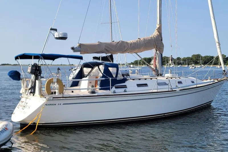 The Image of 1987 Pearson 39-2 sailboat with 2016 Beta engine, anchored on calm water. - 0