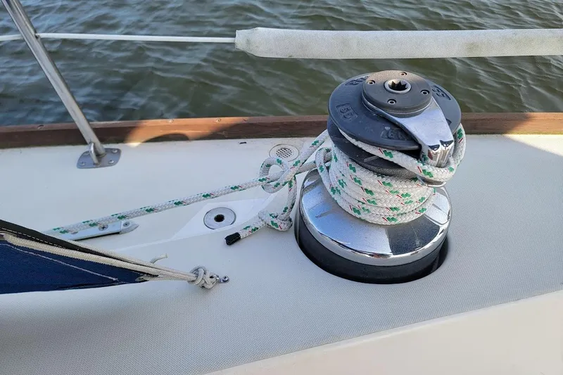 Slide: The Image of Sailboat winch on Pearson 39-2, 1987 model, with 2016 Beta engine, docked on water. - 31