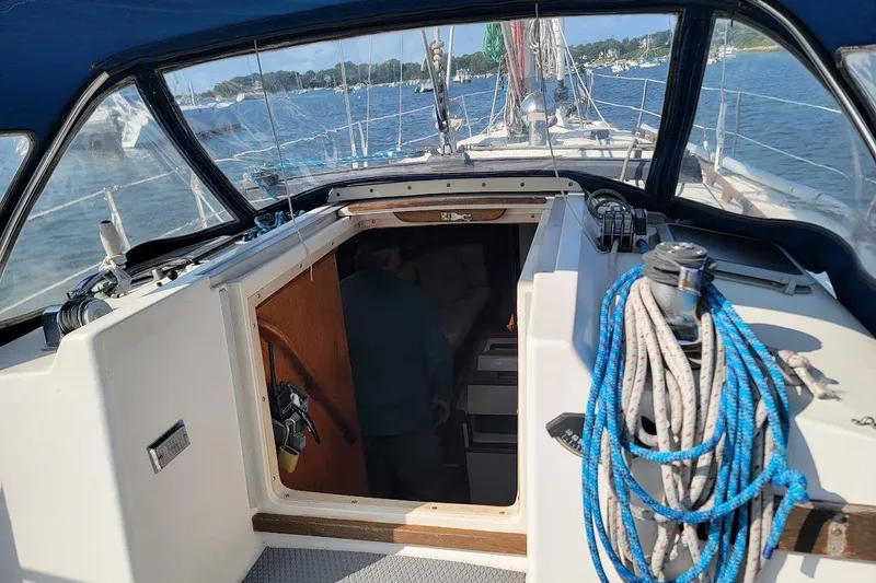 Slide: The Image of Cockpit view of 1987 Pearson 39-2 sailboat with 2016 Beta engine, docked on a sunny day. - 4