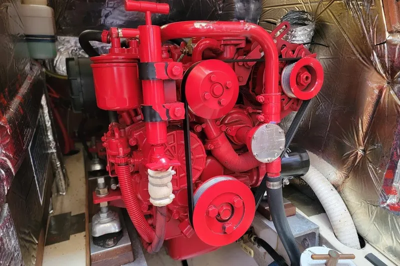 Slide: The Image of Red 2016 Beta engine in 1987 Pearson 39-2 sailboat, surrounded by metallic insulation. - 9