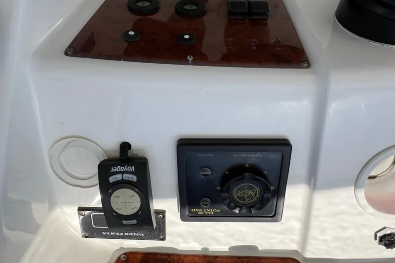 Slide: The Image of Control panel of a 2002 Silverton 453 Motor Yacht with navigation instruments. - 15
