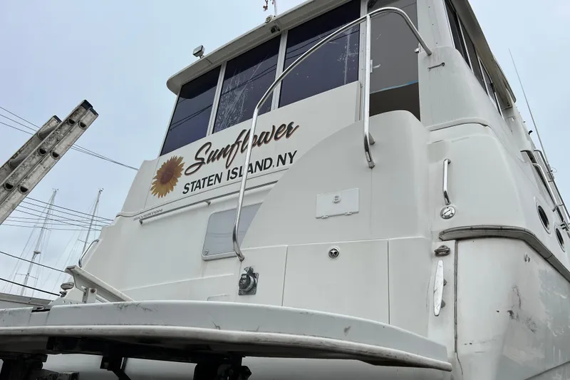 Slide: The Image of 2002 Silverton 453 Motor Yacht "Sunflower" docked in Staten Island, NY. - 2