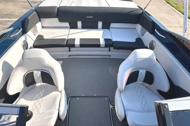 Slide: The Image of 2017 Glastron GT 205 boat interior with stylish seating and modern design. - 12