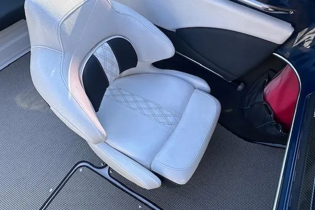 Slide: The Image of 2017 Glastron GT 205 boat interior with stylish white and black seat design. - 15