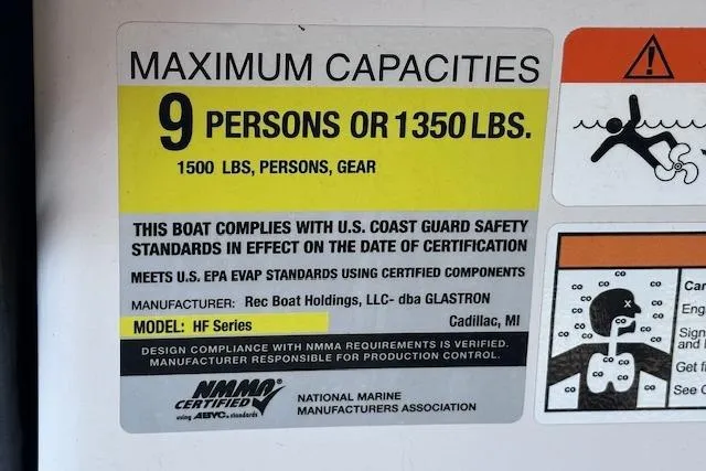 Slide: The Image of 2017 Glastron GT 205 capacity label: 9 persons or 1350 lbs, NMMA certified. - 16