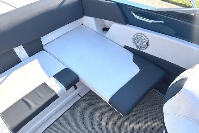 Slide: The Image of Interior seating of 2017 Glastron GT 205 boat with modern upholstery design. - 21