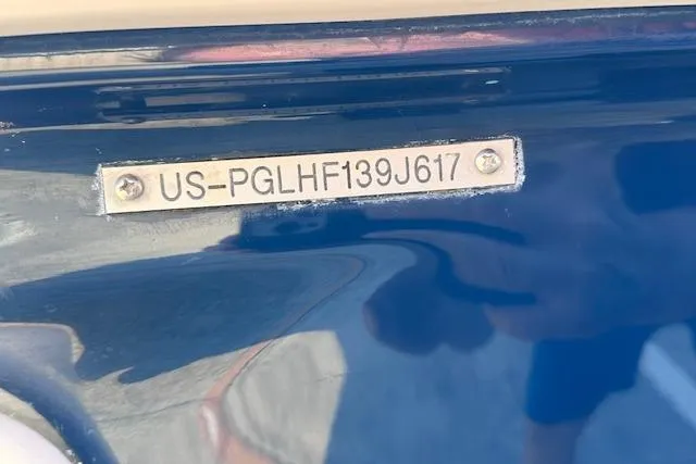 Slide: The Image of 2017 Glastron GT 205 boat hull identification number plate. - 30