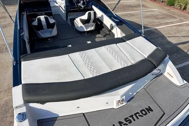 Slide: The Image of 2017 Glastron GT 205 boat interior with seating and sun deck. - 9