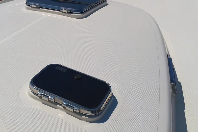 Slide: The Image of 2008 Legacy Yachts 32 deck with hatches and sleek design. - 17