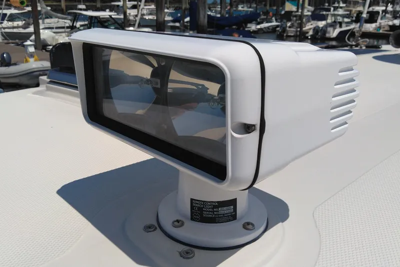 Slide: The Image of Remote-controlled searchlight on 2008 Legacy Yachts 32, docked at marina. - 32