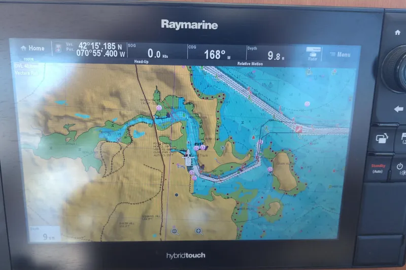 Slide: The Image of Raymarine navigation display on 2008 Legacy Yachts 32, showing nautical chart and coordinates. - 41