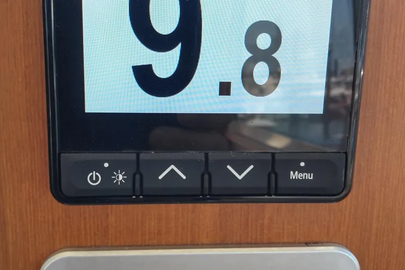 Slide: The Image of Digital display panel on 2008 Legacy Yachts 32, showing number 9.8 with control buttons. - 42