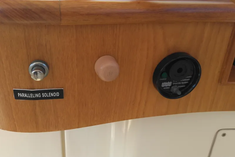 Slide: The Image of Control panel on 2008 Legacy Yachts 32, featuring paralleling solenoid and override system. - 45