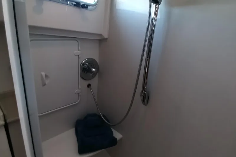 Slide: The Image of Shower area in 2008 Legacy Yachts 32, featuring a sleek design and modern fixtures. - 52