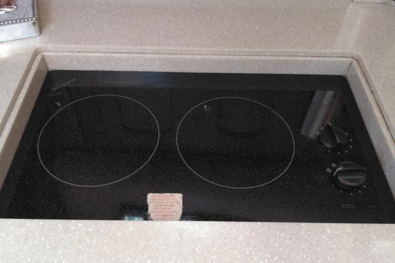 Slide: The Image of Ceramic cooktop in 2008 Legacy Yachts 32 galley kitchen. - 61