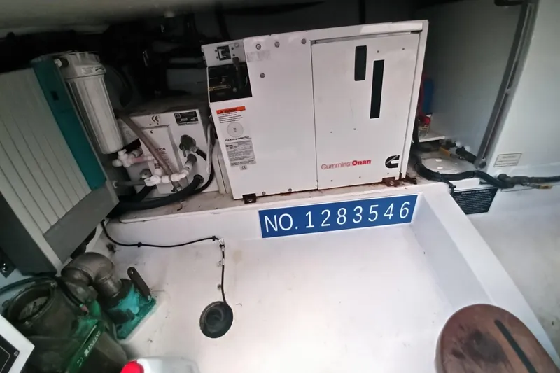 Slide: The Image of Engine room of 2008 Legacy Yachts 32 with Cummins Onan generator. - 71