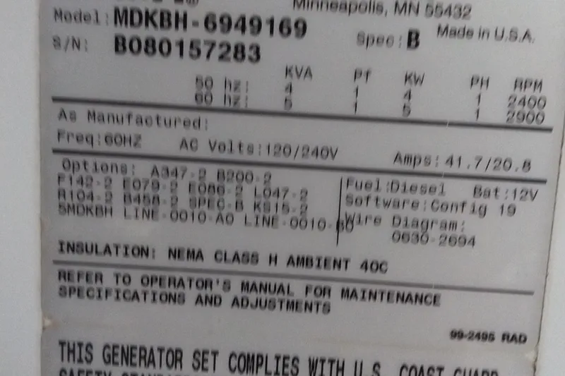 Slide: The Image of Label on generator with specifications, including model MDKBH-6949169, diesel fuel, 60Hz, 120/240V. - 72