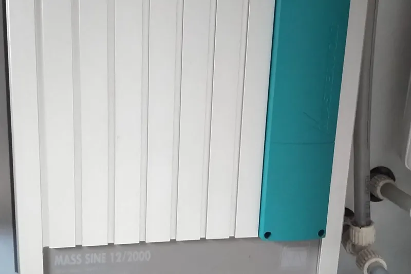 Slide: The Image of Electrical panel on 2008 Legacy Yachts 32, featuring Mass Sine 12/2000 inverter. - 75