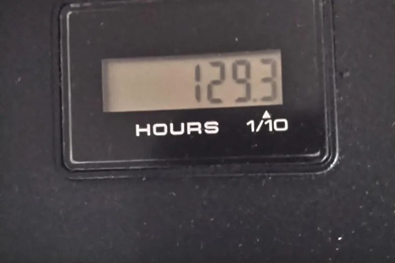 Slide: The Image of Hour meter displaying 129.3 hours on 2008 Legacy Yachts 32. - 77