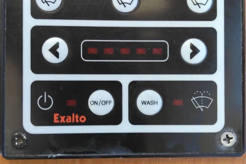 Slide: The Image of Control panel of a 2008 Legacy Yachts 32, featuring Exalto wiper controls. - 79