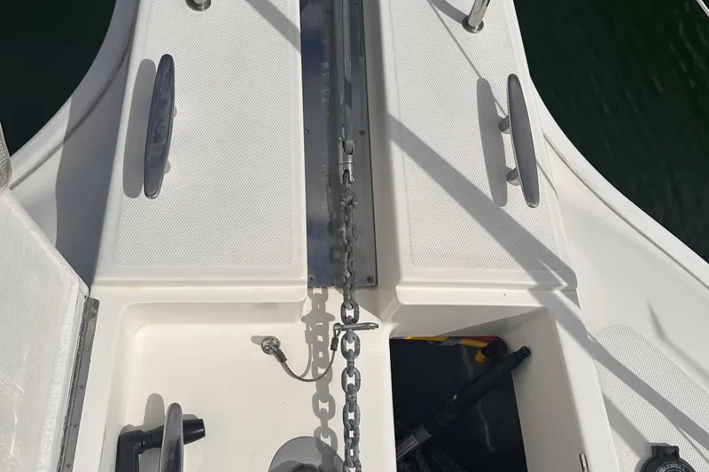 Slide: The Image of 2005 Silverton 42 Convertible boat deck with anchor chain and cleats. - 10