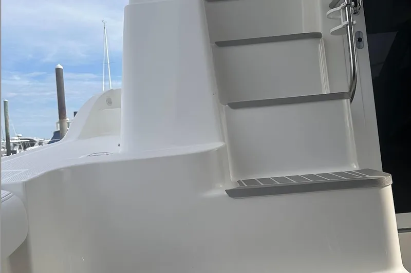 Slide: The Image of Staircase on 2005 Silverton 42 Convertible yacht, docked at marina. - 5