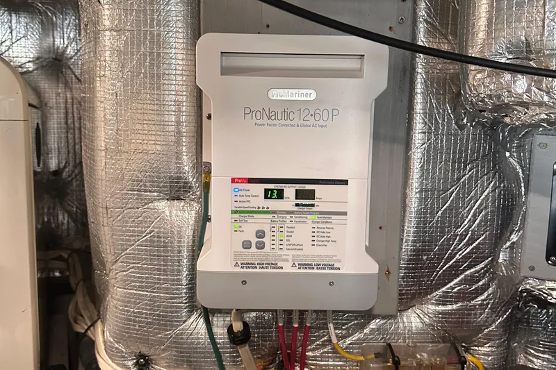 Slide: The Image of ProMariner ProNautic 12-60P charger in 2004 Silverton 42 Convertible yacht engine room. - 62