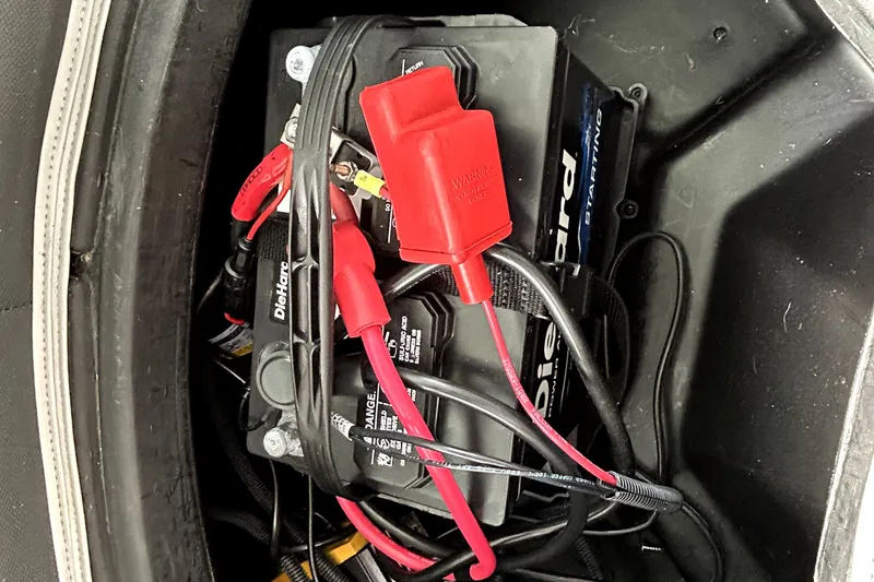 Slide: The Image of Battery compartment of a 2022 Veranda Relax VR22RC with cables and connectors. - 10