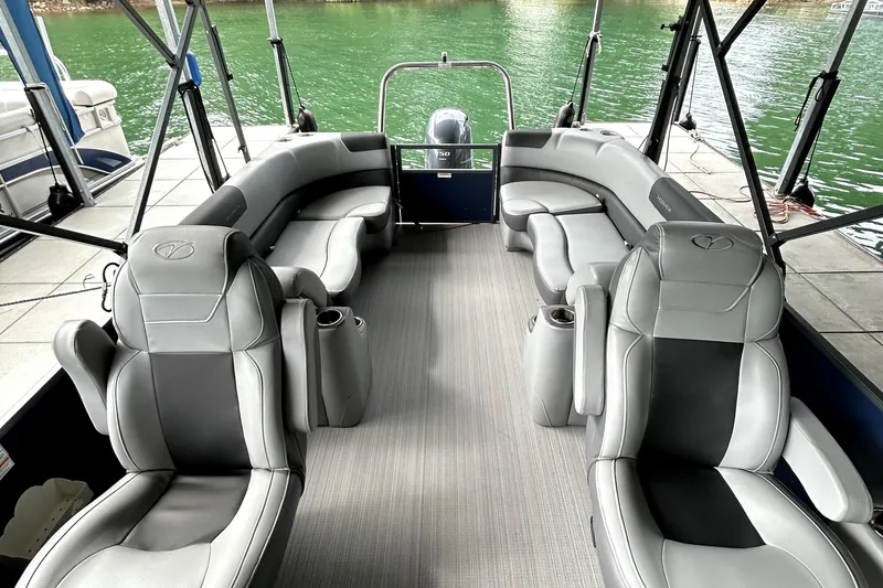 Slide: The Image of 2022 Veranda Relax VR22RC pontoon boat interior with luxurious seating and lake view. - 5