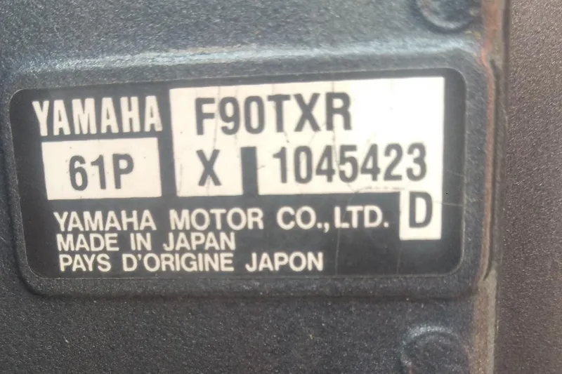 Slide: The Image of Yamaha F90TXR engine label on 2011 Eastern 20' Center Console boat. Made in Japan. - 10