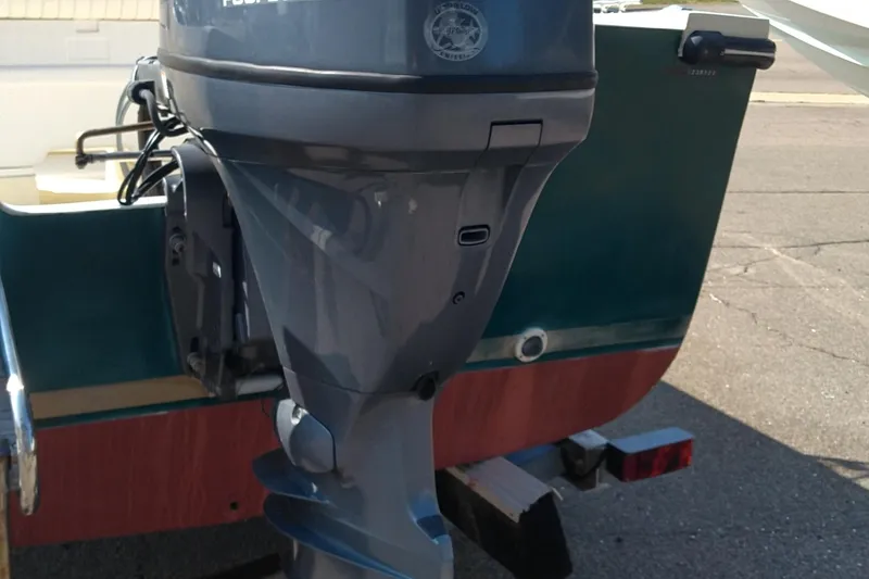 Slide: The Image of 2011 Eastern 20' Center Console boat with outboard motor, rear view. - 7