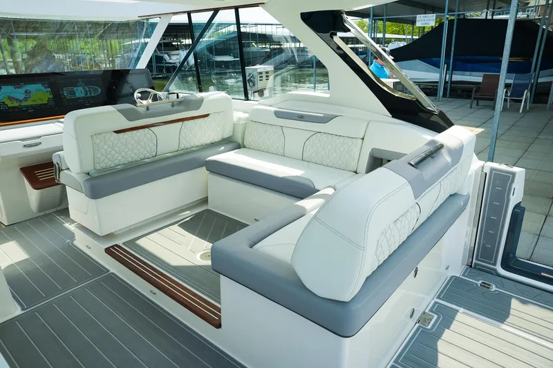 Slide: The Image of Luxurious interior of 2025 Regal LX43 boat with elegant seating and modern design. - 7