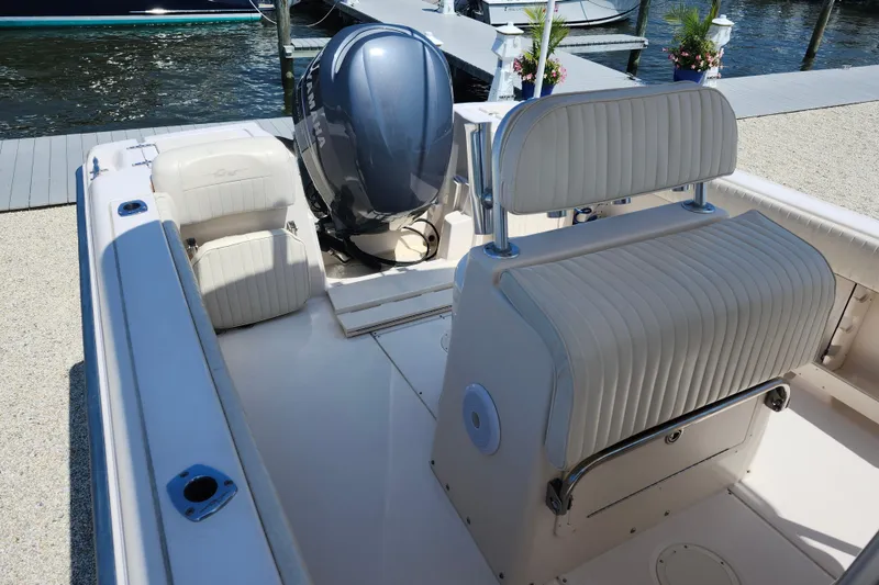 Slide: The Image of 2008 Grady-White Fisherman 222 boat interior with seating and Yamaha outboard motor. - 10