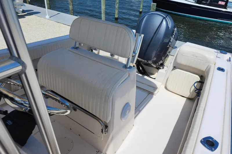 Slide: The Image of 2008 Grady-White Fisherman 222 boat interior with seating and Yamaha outboard motor. - 11