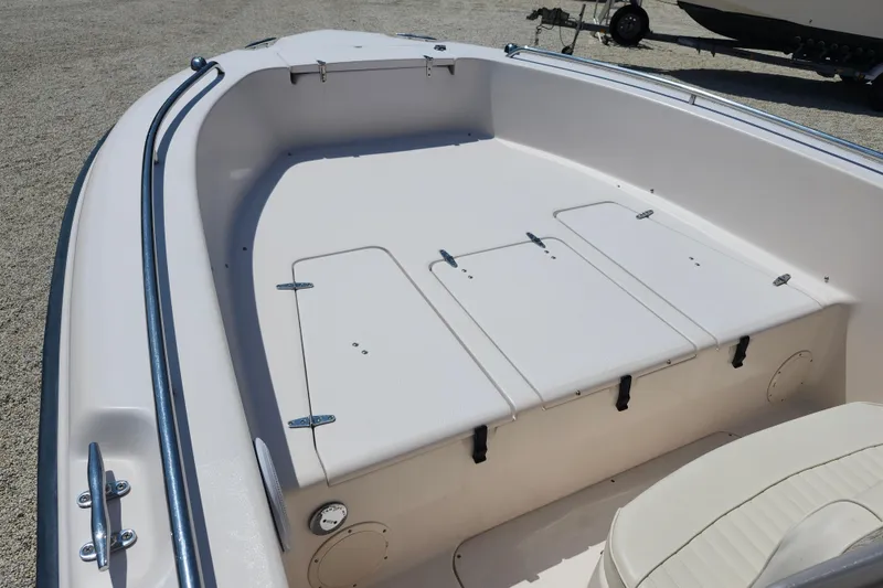 Slide: The Image of 2008 Grady-White Fisherman 222 boat deck with storage compartments. - 12