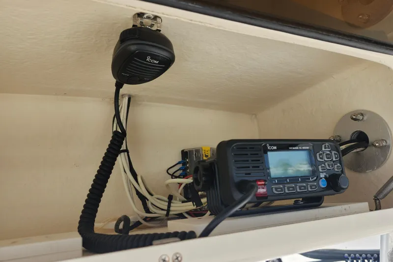 Slide: The Image of ICOM marine radio setup on 2008 Grady-White Fisherman 222 boat. - 19