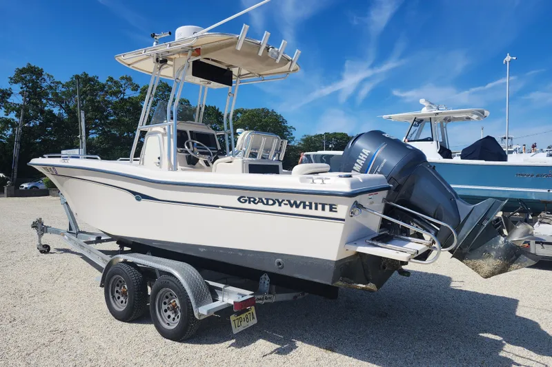 Slide: The Image of 2008 Grady-White Fisherman 222 boat on trailer with Yamaha outboard motor. - 2