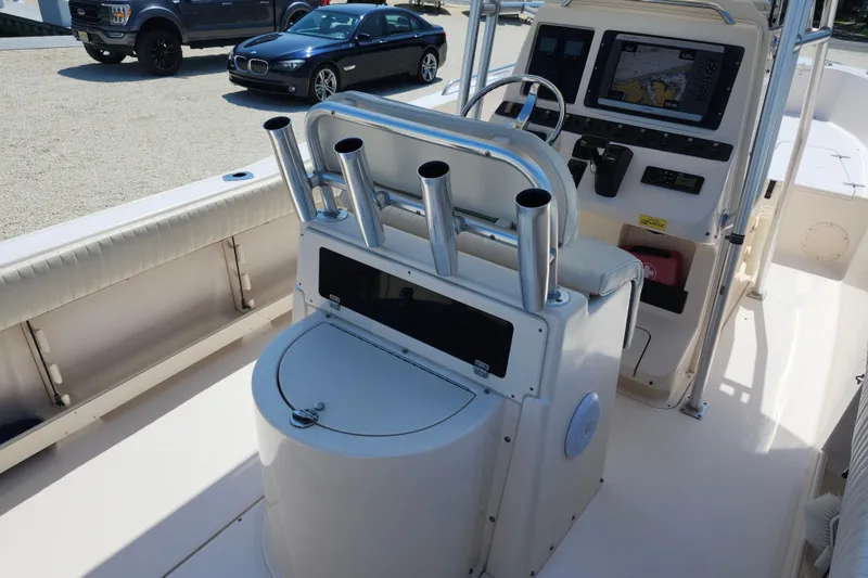 Slide: The Image of 2008 Grady-White Fisherman 222 boat interior with console and rod holders. - 22