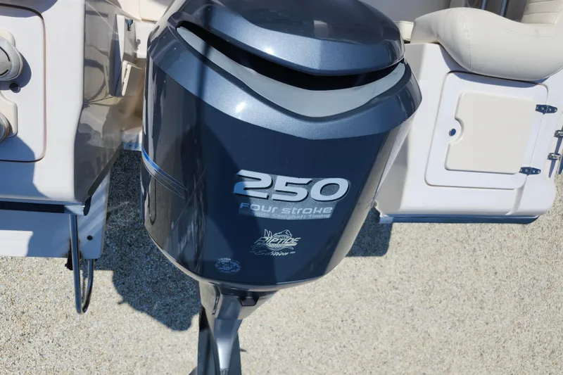 Slide: The Image of Outboard motor on a 2008 Grady-White Fisherman 222 boat, featuring a 250 horsepower four-stroke engine. - 26