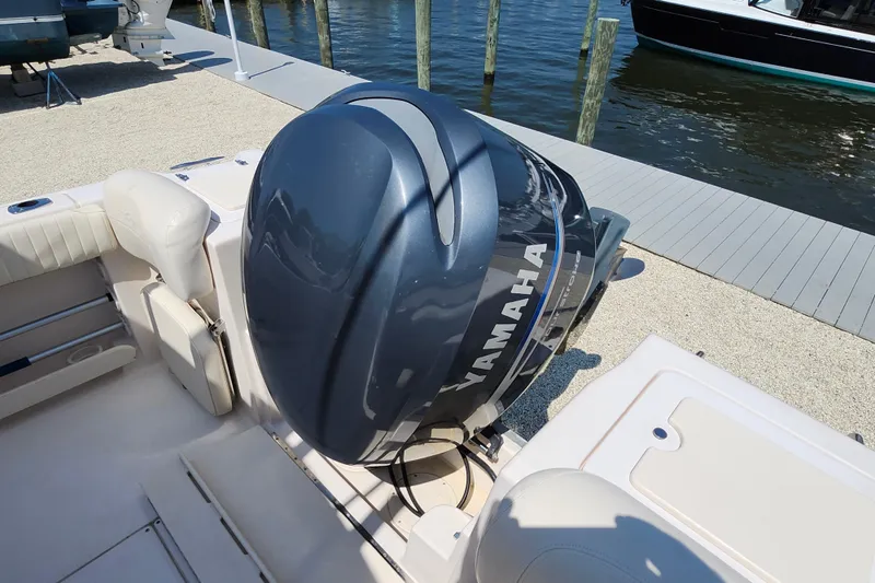 Slide: The Image of 2008 Grady-White Fisherman 222 with Yamaha outboard engine at dockside. - 27
