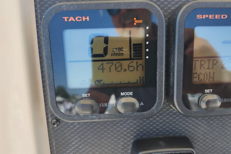 Slide: The Image of Tachometer display on 2008 Grady-White Fisherman 222 boat, showing 470.6 hours. - 29