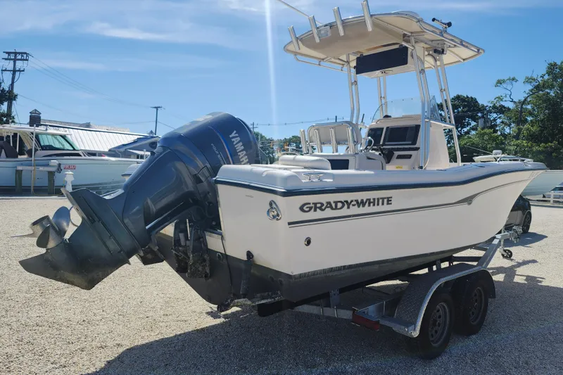 Slide: The Image of 2008 Grady-White Fisherman 222 boat on trailer, featuring Yamaha outboard motor. - 4