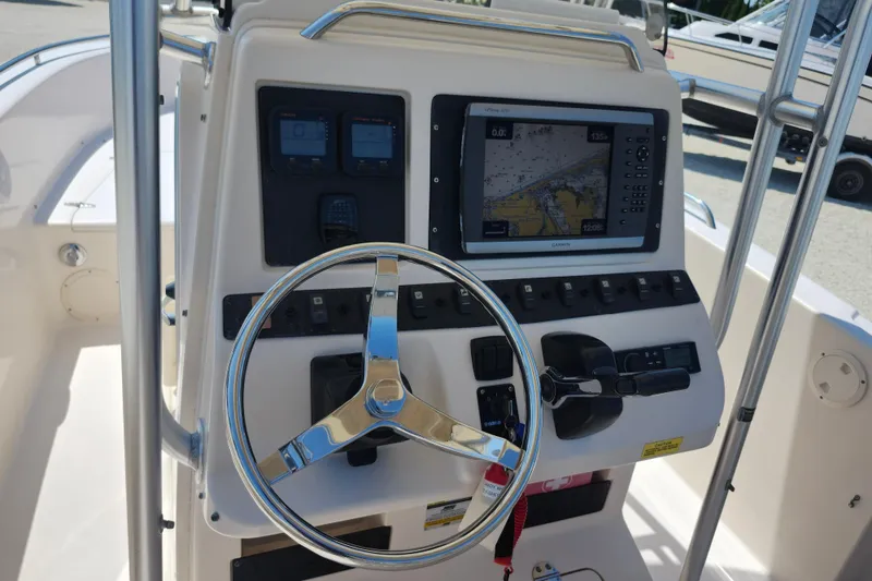 Slide: The Image of 2008 Grady-White Fisherman 222 boat console with steering wheel and navigation system. - 7