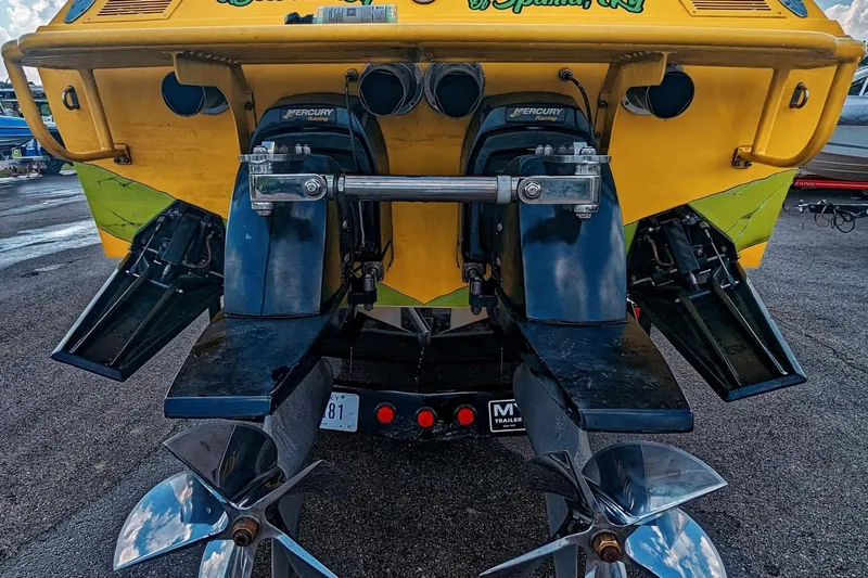 Slide: The Image of 1999 Outerlimits 37 Stiletto boat with dual Mercury Racing engines, rear view. - 6