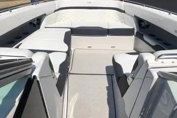 Slide: The Image of 2020 Regal 3300 Bowrider interior with spacious seating and modern design. - 11