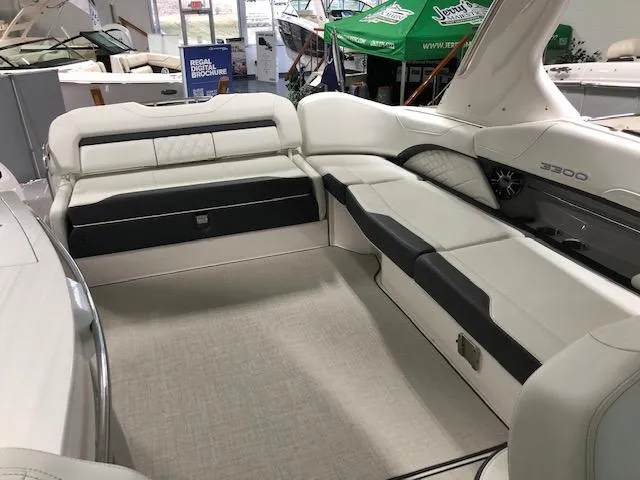 Slide: The Image of 2020 Regal 3300 Bowrider interior with luxurious seating and modern design. - 18