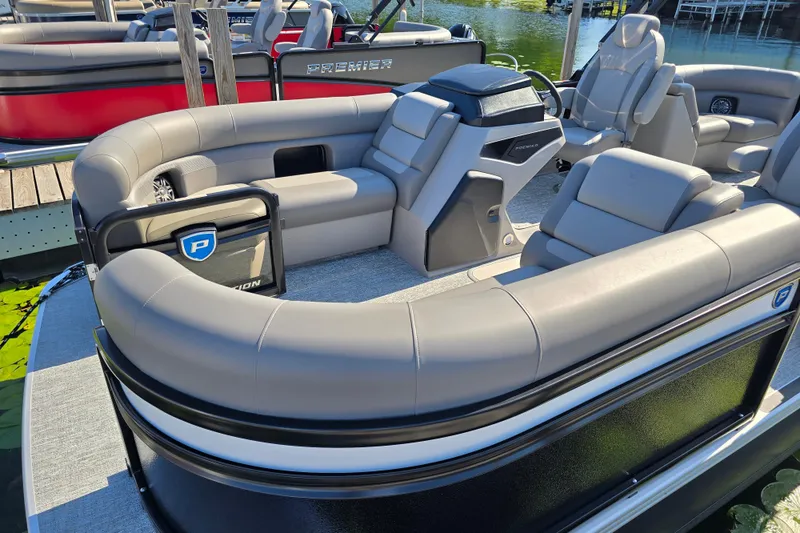Slide: The Image of 2025 Premier 210 Sunsation RF pontoon boat with luxurious seating and modern design. - 5